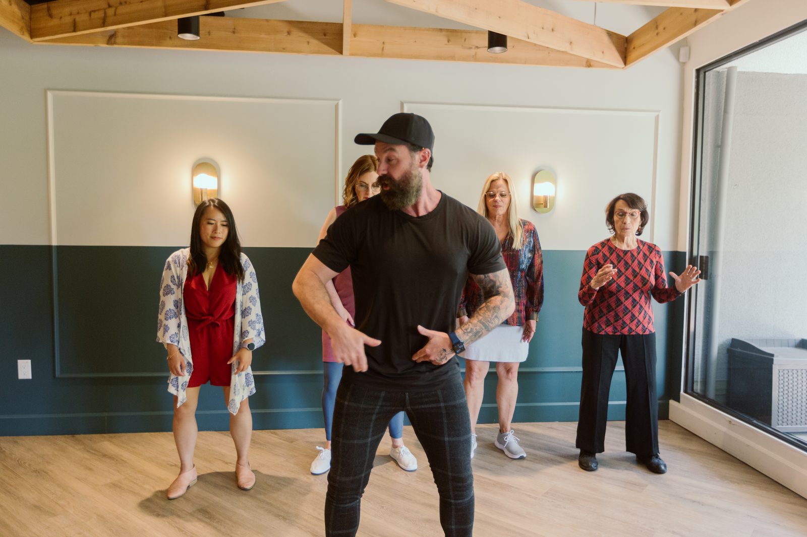 Midlife women of various ages learning movement patterns with TurnFit coach David Turnbull in Vancouver