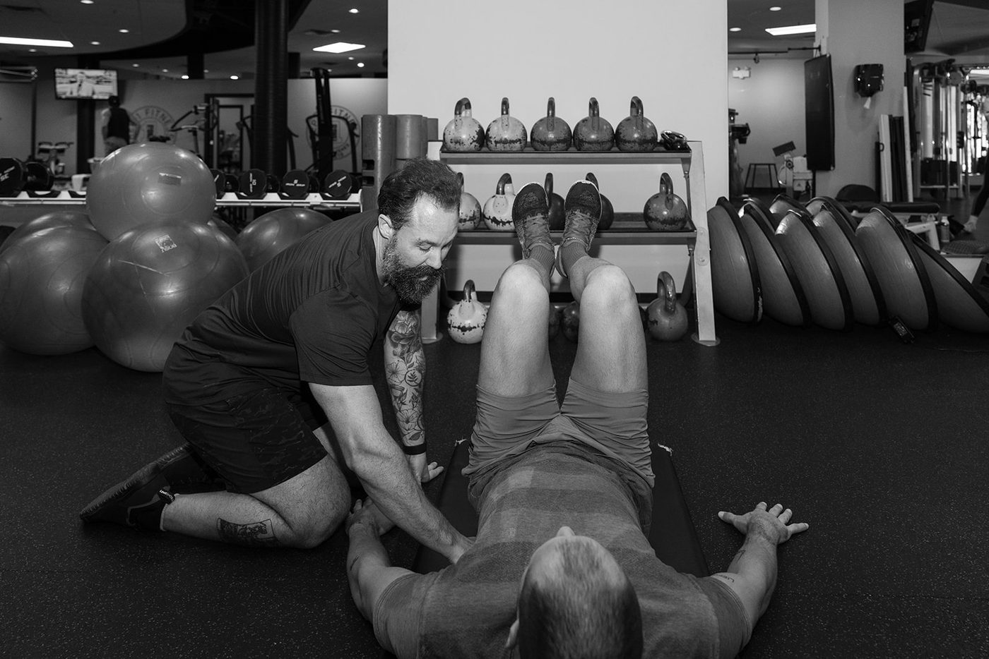 Foam rolling and active recovery techniques with a personal trainer in Vancouver