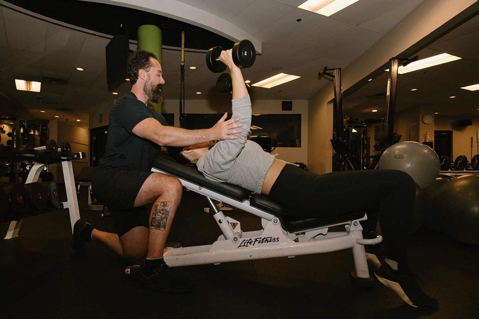 Personal trainer demonstrating strength training techniques in Vancouver