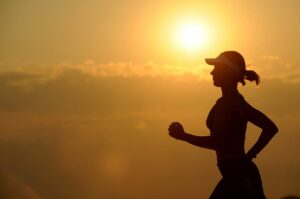 woman running at sunrise